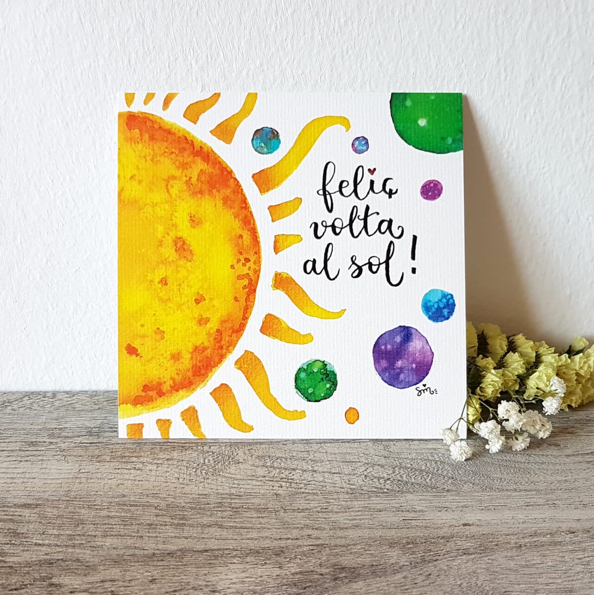 Làmina 14x14 “Feliç volta al sol!”